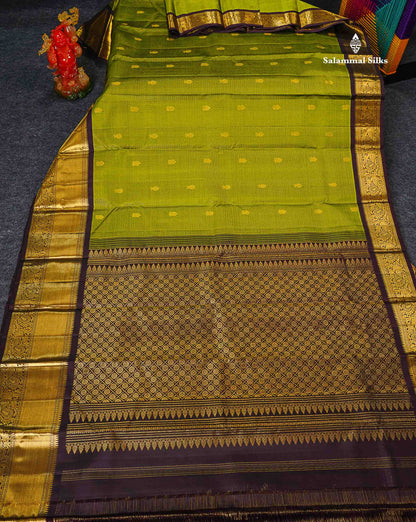 Pure Kanjivaram Silk Saree - Olive Green Tiny Zari Checks With Butta Along With Contrast Dark Brown Traditional Evening Morning Border