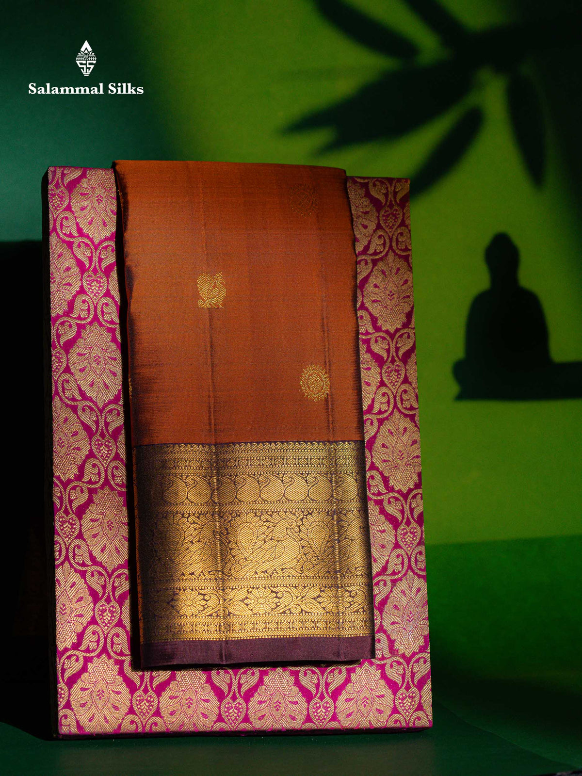 Beautiful Rust Orange Chakaram & Peacock Butta Pure Kanjivaram Silk Saree With Contrast Dark Brown Traditional Border