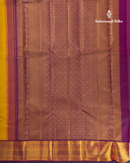 Mustard Yellow Pure Kanjivaram Silk Saree With Contrast Dark Purple Traditional Border