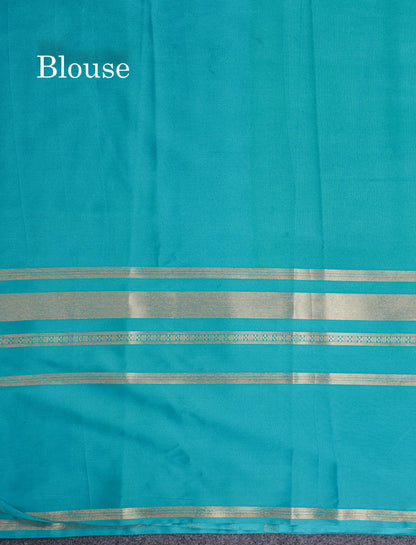 Manthulir Yellow Semi Mysore Crepe Saree With Contrast Sapphire Blue Long Gap Border