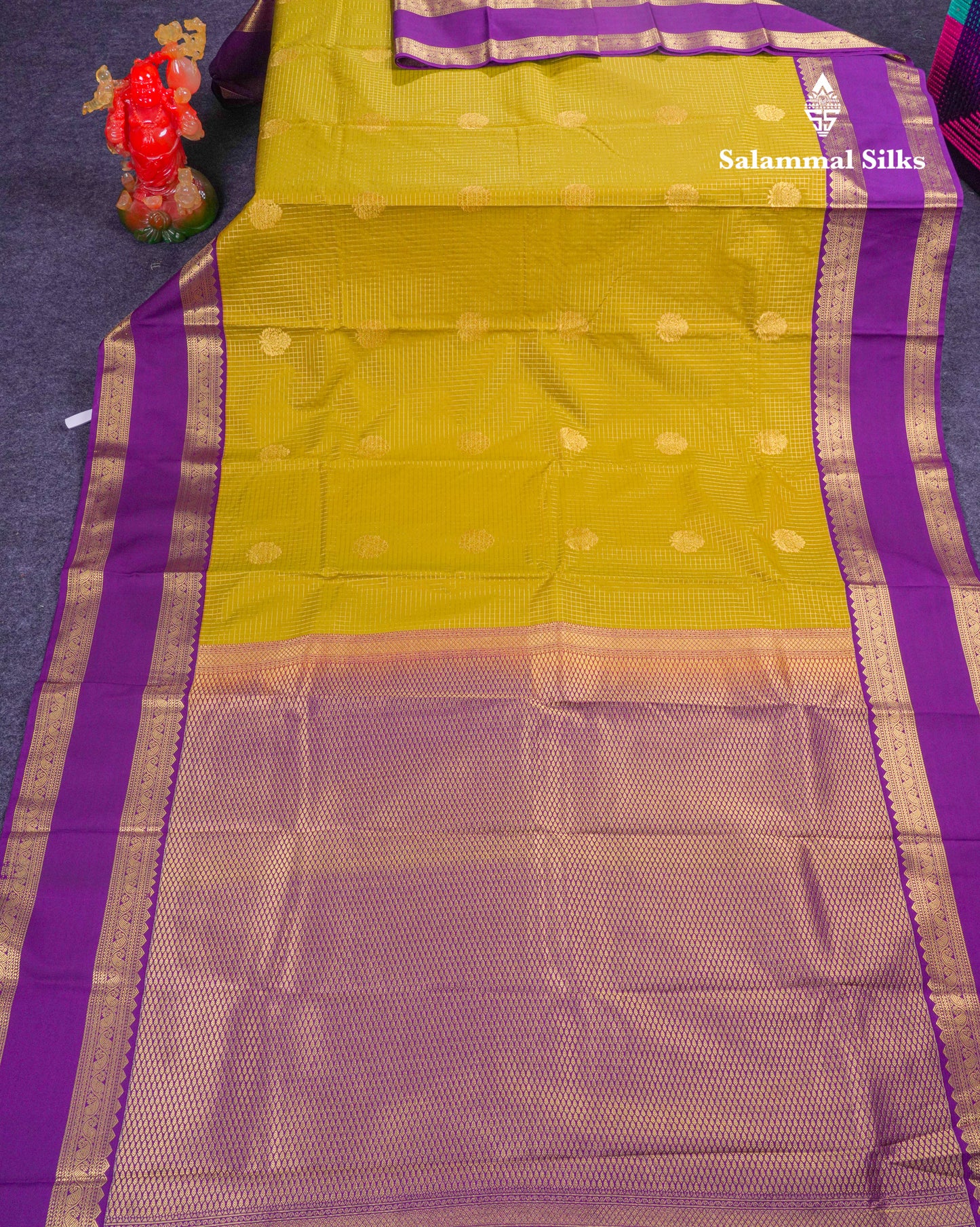 Beautiful Manthulir Yellow Checks Semi Silk Saree With Contrast Dark Purple Traditional Rettapet Border