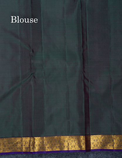 Rust Orange Pure Kanjivaram Silk Saree With Contrast Dark Bottle Green Blouse