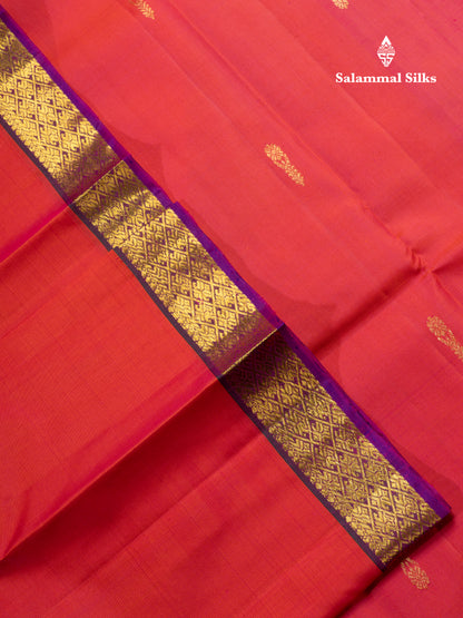 Rust Orange Pure Kanjivaram Silk Saree With Contrast Dark Bottle Green Blouse