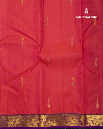 Rust Orange Pure Kanjivaram Silk Saree With Contrast Dark Bottle Green Blouse