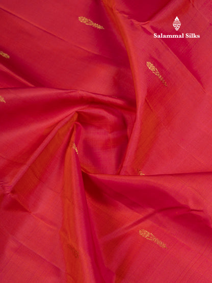 Rust Orange Pure Kanjivaram Silk Saree With Contrast Dark Bottle Green Blouse