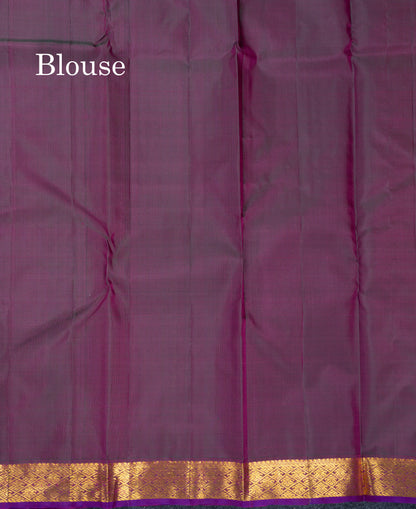 Rust Orange Pure Kanjivaram Silk Saree With Contrast Dark Bottle Green Blouse