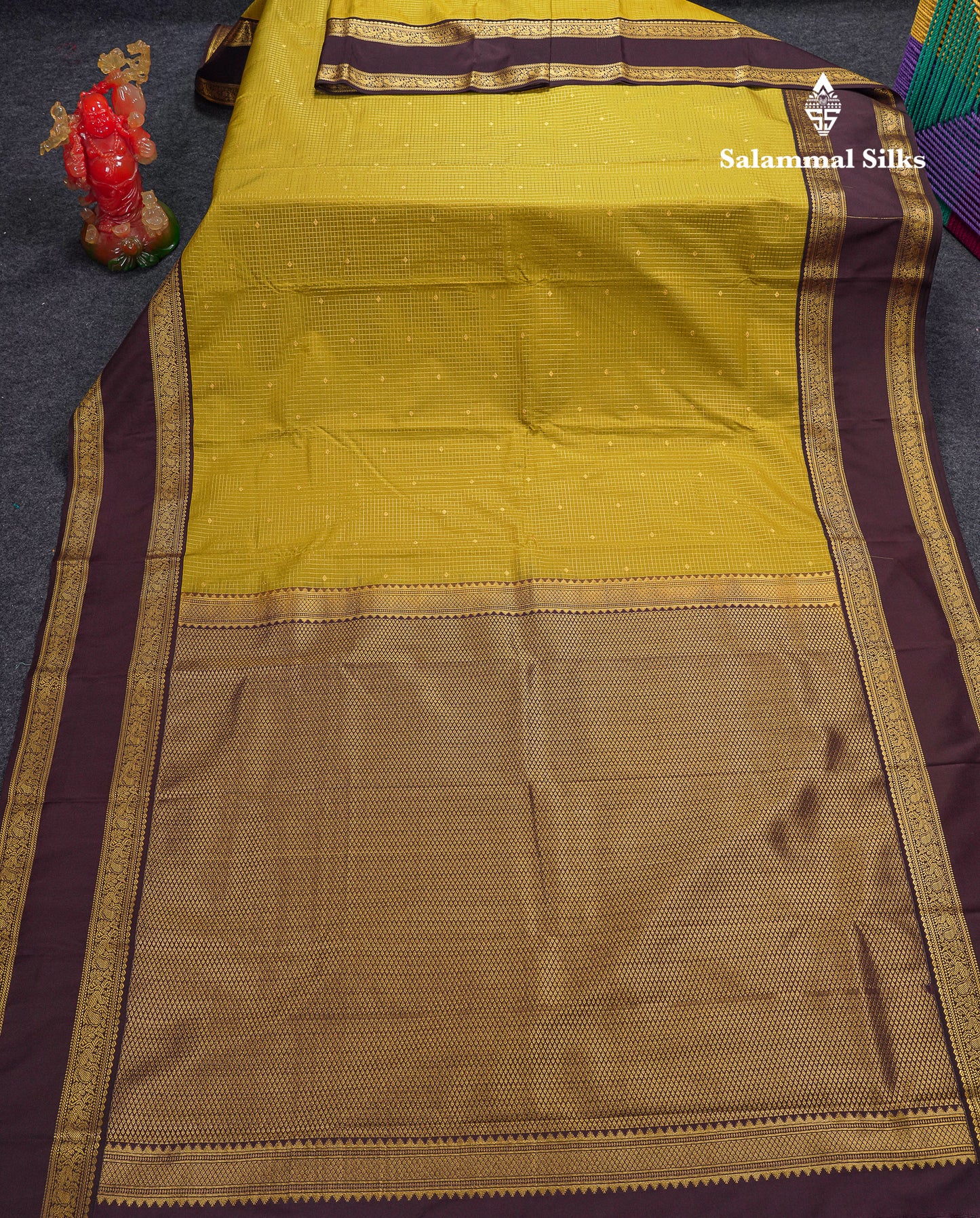 Beautiful Manthulir Yellow Checks With Butta Semi Silk Saree With Contrast Dark Brown Traditional Rettapet Border