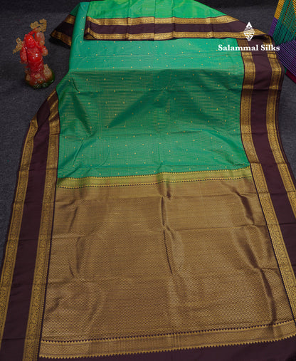 Beautiful Manthulir Yellow Checks With Butta Semi Silk Saree With Contrast Dark Brown Traditional Rettapet Border