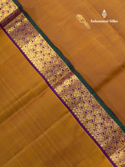 Rust Orange Pure Kanjivaram Silk Saree With Contrast Dark Bottle Green Blouse