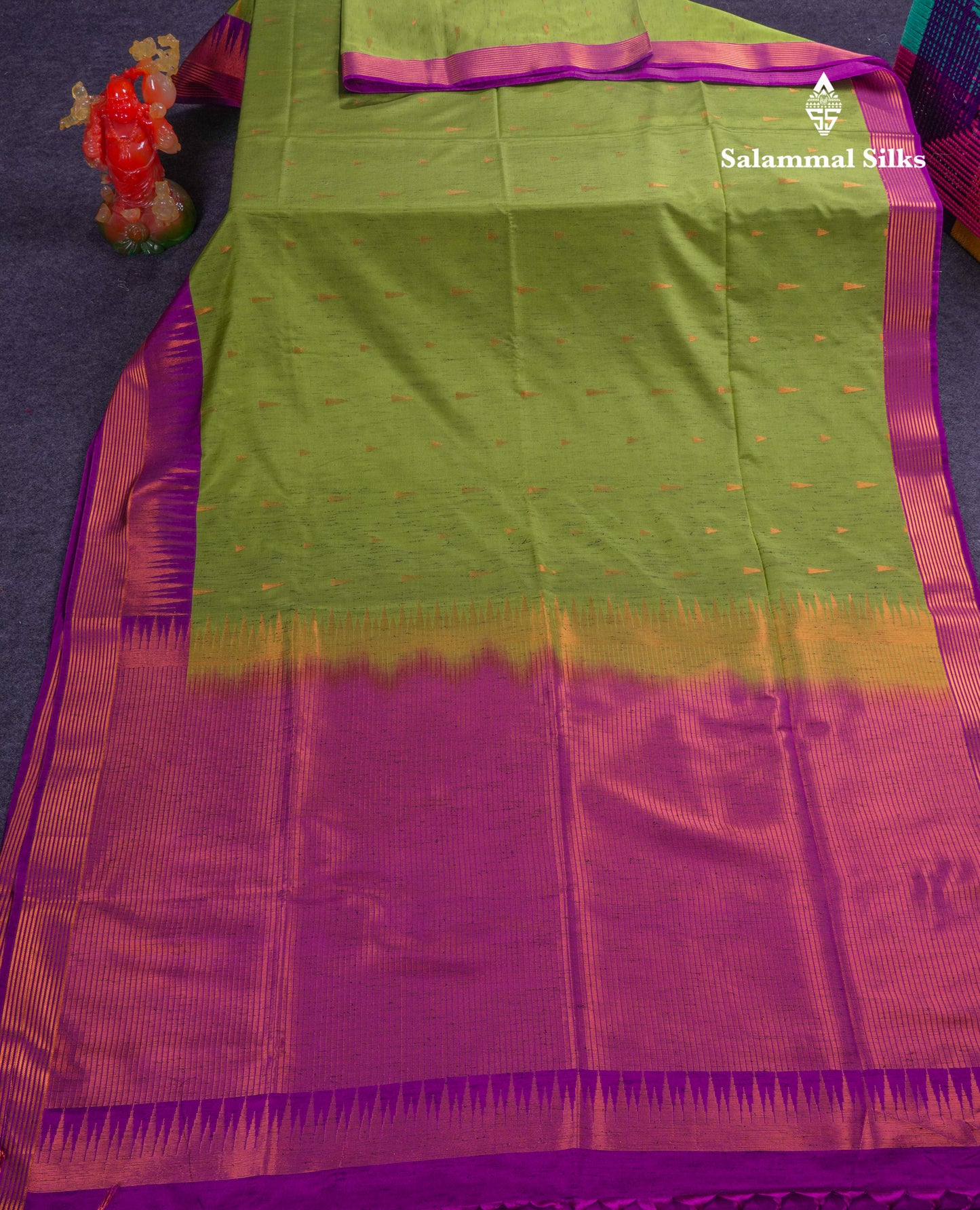 Beautiful Parrot Green Jute Semi Soft Silk Saree With Contrast Dark Purple Temple Border