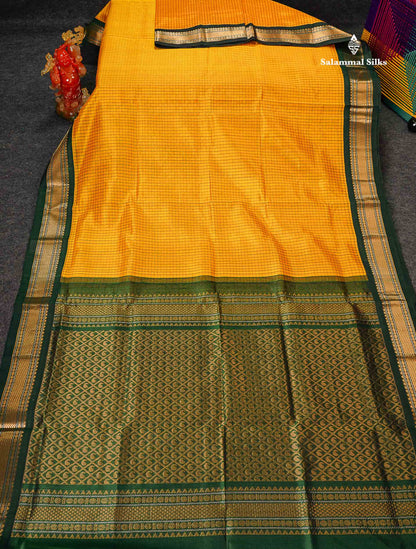 Pure Silk Cotton Saree - Mustard Yellow Small Checks Along With Contrast Bottle Green Traditional Border