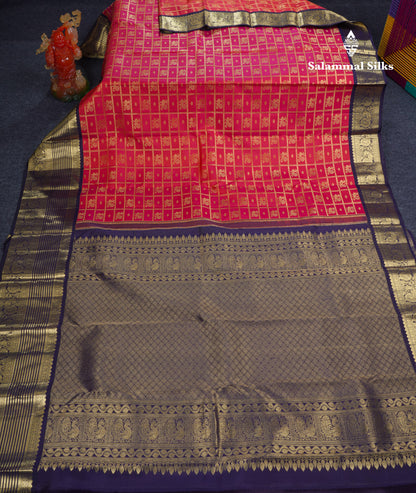 Dual Tone Pinkish Orange Pure Kanjivaram Silk Saree With Contrast Navy Blue Traditional Border