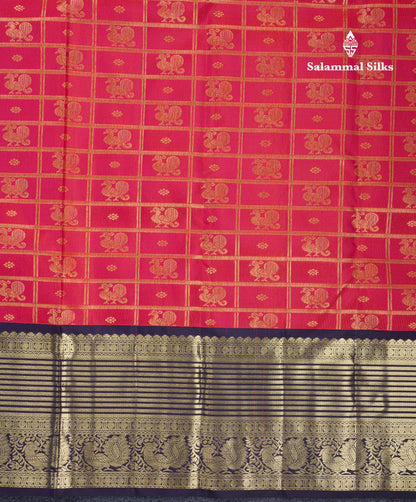 Dual Tone Pinkish Orange Pure Kanjivaram Silk Saree With Contrast Navy Blue Traditional Border
