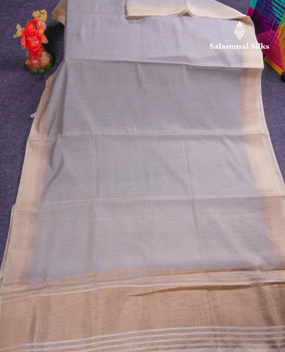 Light Grey Tissue Semi Tussar Fancy Saree With Contrast Cream Blouse