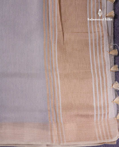 Light Grey Tissue Semi Tussar Fancy Saree With Contrast Cream Blouse