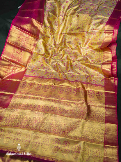 Beautiful Manthulir Yellow Tissue Bridal Pure Kanjivaram Silk Saree With Contrast Pink Traditional Evening Morning Border