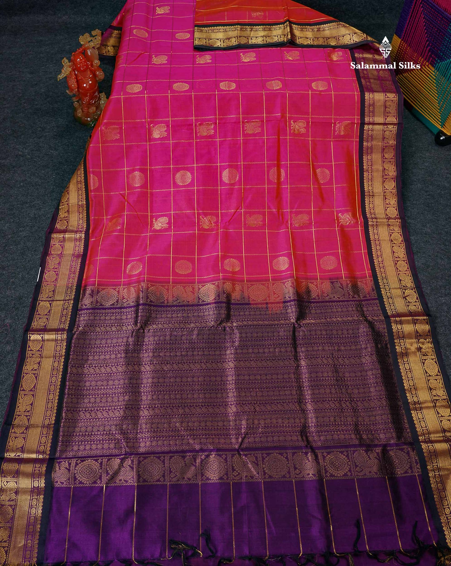 Pure Silk Cotton Saree - Pinkish Orange Checks With Butta Along With Contrast Dark Purple Traditional Border