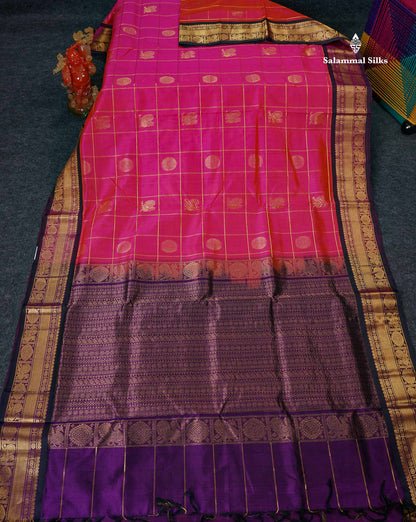 Pure Silk Cotton Saree - Pinkish Orange Checks With Butta Along With Contrast Dark Purple Traditional Border