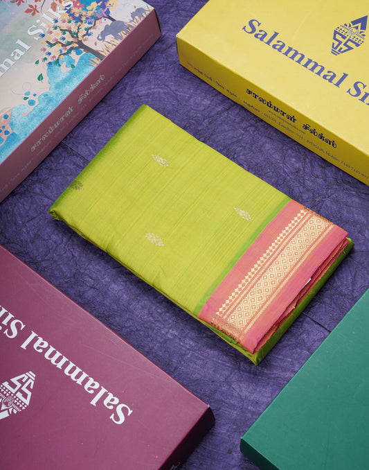 Parrot Green Pure Kanjivaram Silk Saree With Contrast Pinkish Orange One Side Border