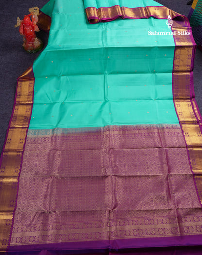 Beautiful Sapphire Green Pure Kanjivaram Silk Saree With Contrast Magenta Traditional Border