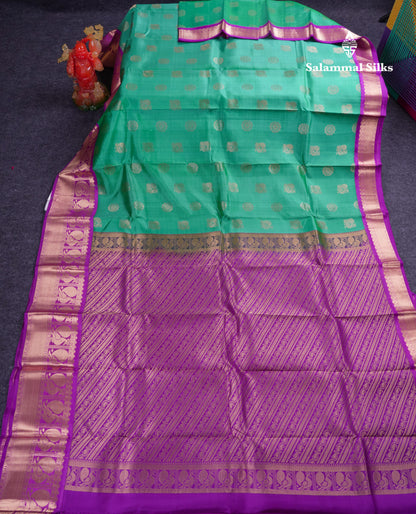 Beautiful Saffire Green Pure Kanjivaram Silk Saree With Contrast Dark Purple Traditional Border