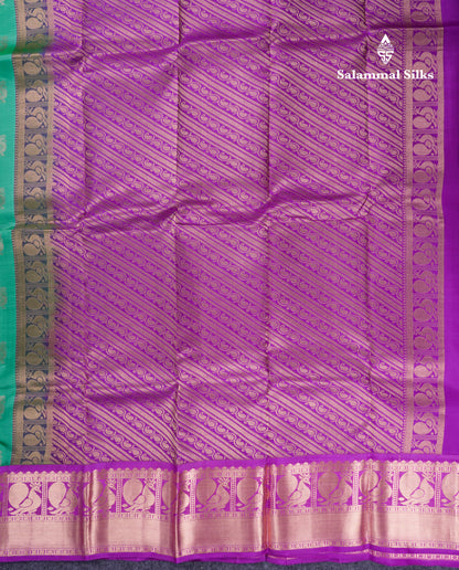 Beautiful Saffire Green Pure Kanjivaram Silk Saree With Contrast Dark Purple Traditional Border