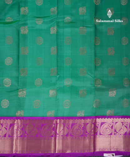 Beautiful Saffire Green Pure Kanjivaram Silk Saree With Contrast Dark Purple Traditional Border