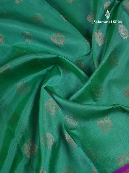 Beautiful Saffire Green Pure Kanjivaram Silk Saree With Contrast Dark Purple Traditional Border