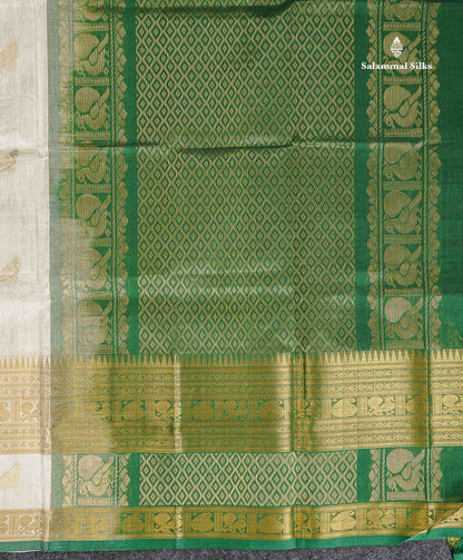 Pure Silk Cotton Saree - Half White Parrot Butta Along With Traditional Evening Morning Border