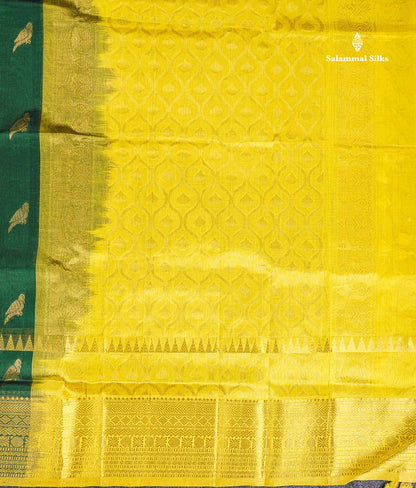 Pure Silk Cotton Saree - Bottle Green Parrot Butta Along With Traditional Evening Morning Border
