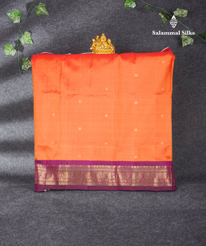 Pure Silk Pure Zari Pattu Pavadai (Orange) With Contrast Purple Border