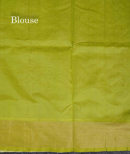Contrast Parrot Green Blouse Of Half White Semi Silk Cotton Saree