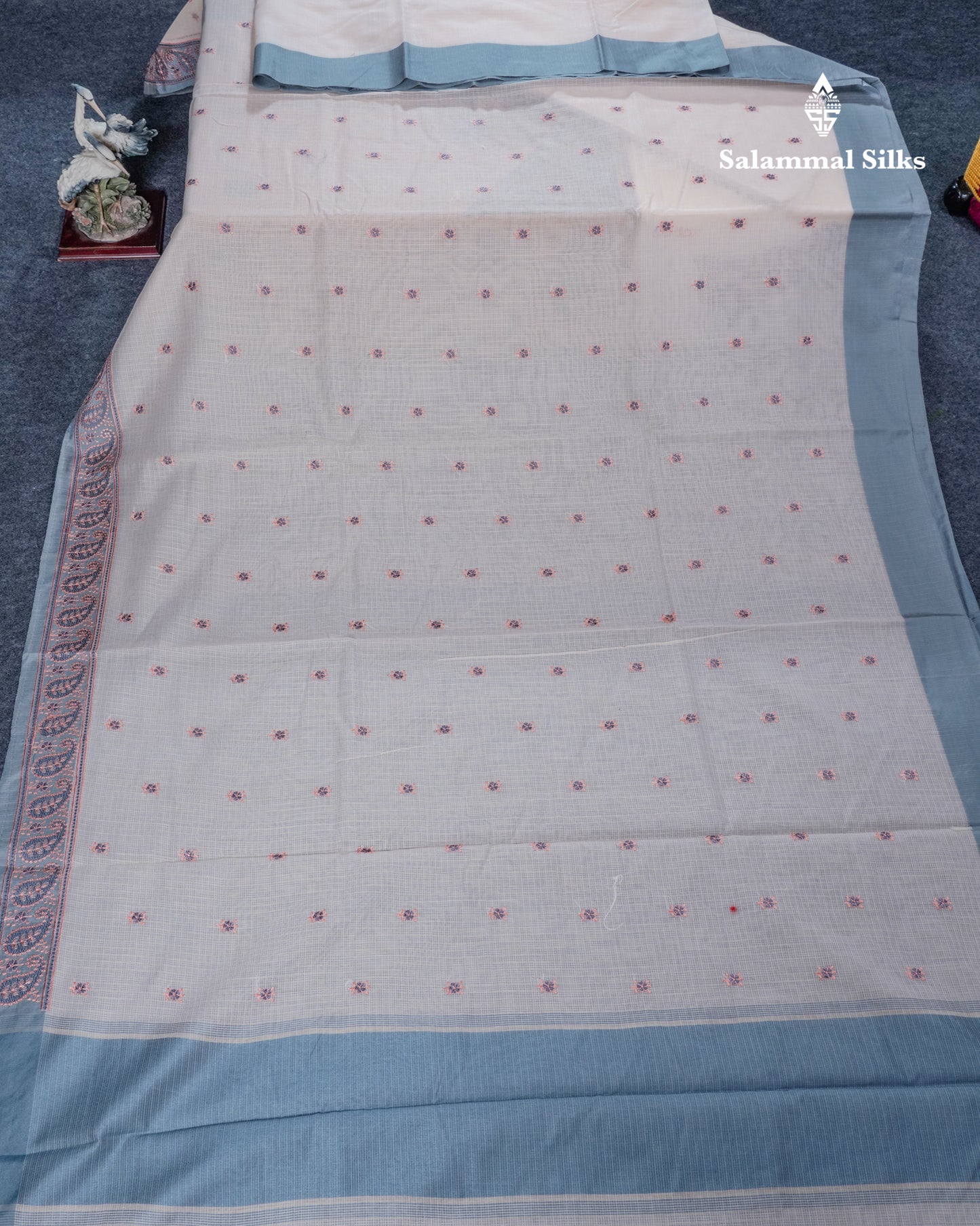 Cream Sandal Silk Kota Fancy Saree With Contrast Grey Embroidery Border