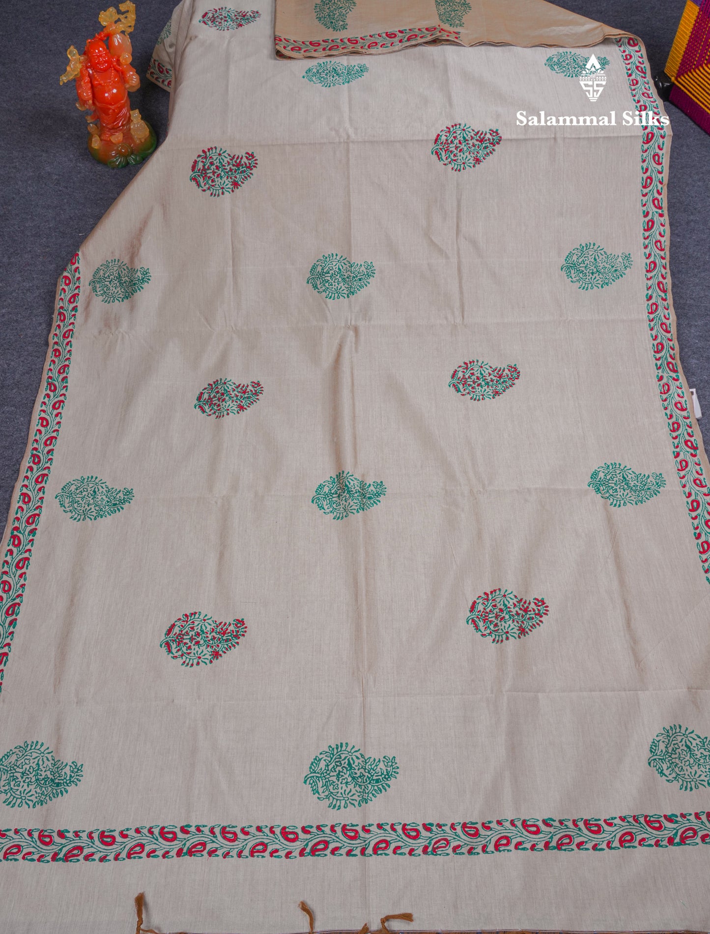 Cream Sandal South Cotton Printed Saree With Contrast Saffire Green Blouse