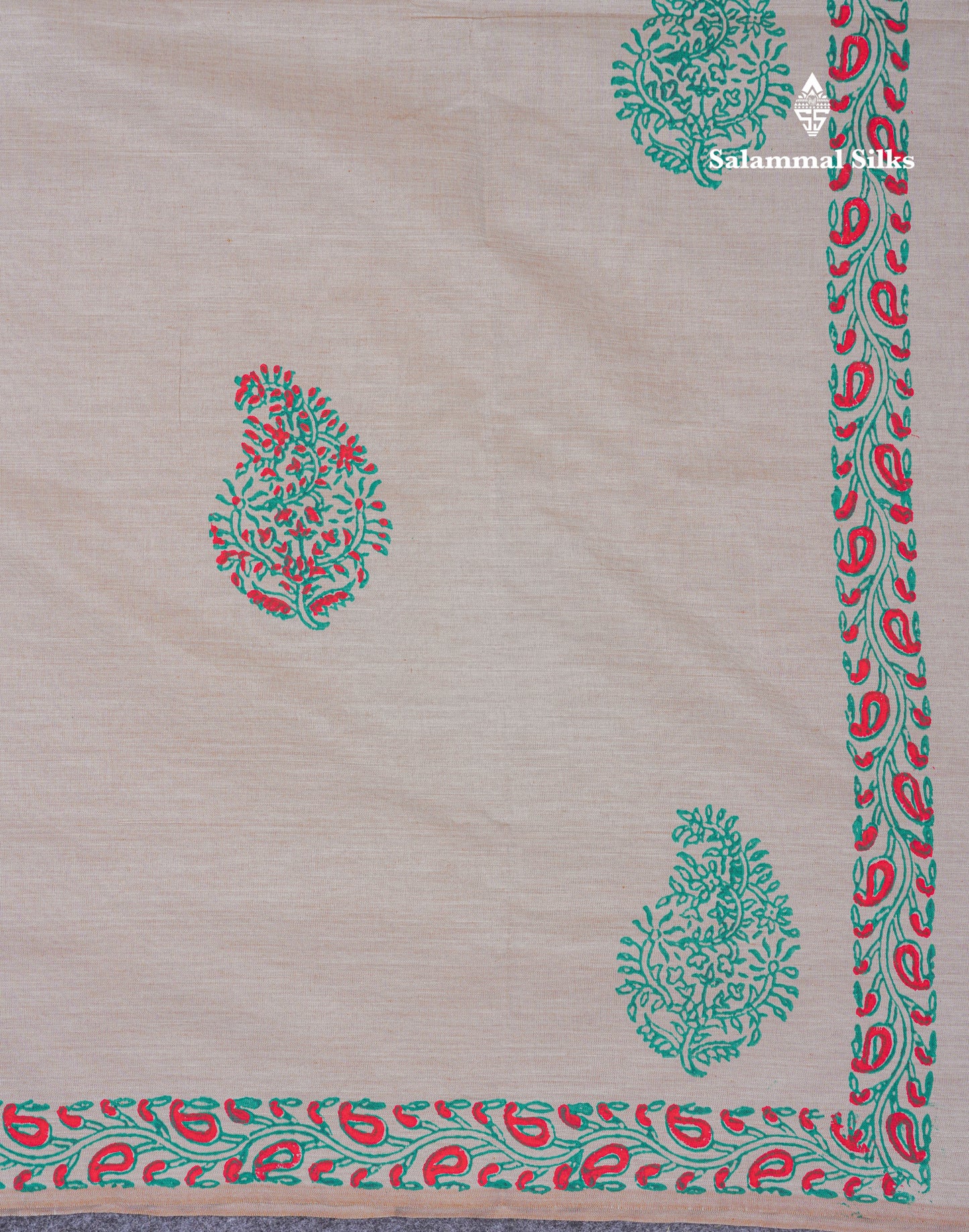 Cream Sandal South Cotton Printed Saree With Contrast Saffire Green Blouse