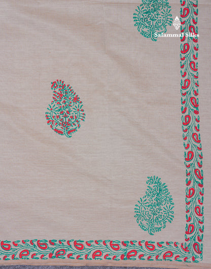 Cream Sandal South Cotton Printed Saree With Contrast Saffire Green Blouse