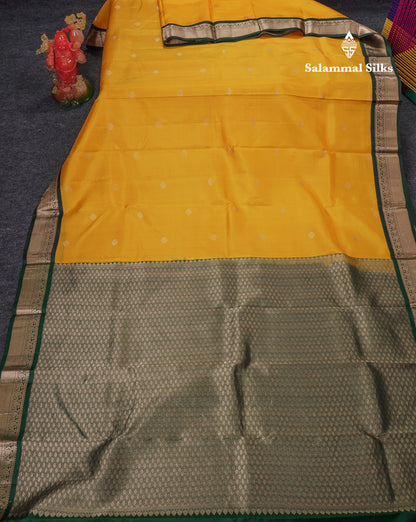 Beautiful Yellow Pure Kanjivaram Silk Saree With Contrast Bottle Green Traditional Medium Border