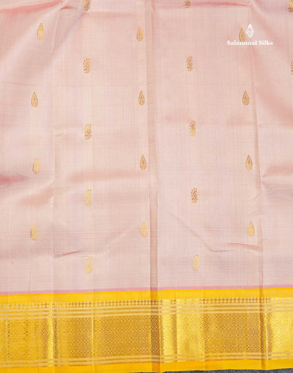 One Side Border Pure Silk Saree - Peach Colour Body Small Zari Butta With Contrast Yellow Traditional Border