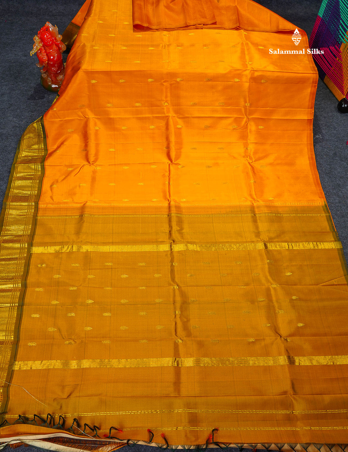 One Side Border Pure Silk Saree - Yellow Colour Body Small Zari Butta With Contrast Olive Green Traditional Border