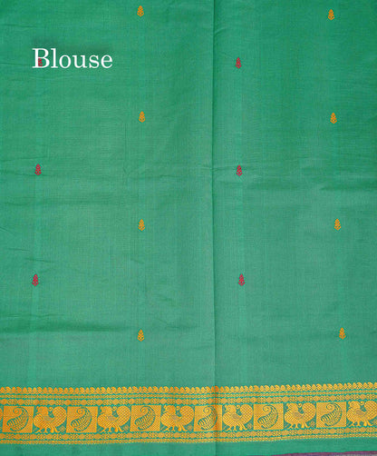Contrast Green Blouse Of Dark Maroon Semi Silk Cotton Saree 