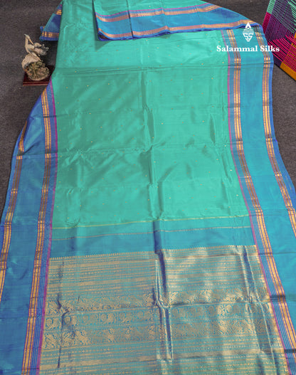 Dual Tone Sapphire Green Pure Kanjivaram Silk Saree With Contrast Dual Tone Blue Rettapet Double Border