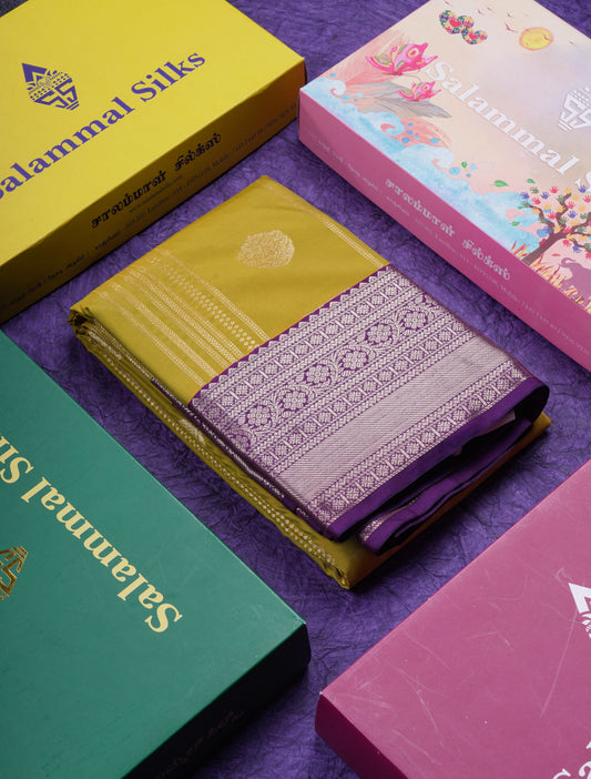 Beautiful Manthulir Yellow Semi Silk Saree With Contrast Dark Purple Traditional Border