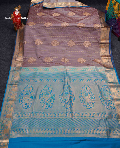 Beautiful Dual Tone Onion Pink Vertical Zari Line With Butta Semi Silk Saree With Contrast Light Blue Blouse