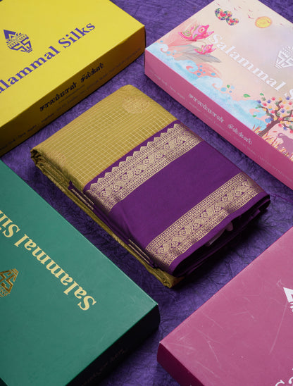Beautiful Manthulir Yellow Checks Semi Silk Saree With Contrast Dark Purple Traditional Rettapet Border