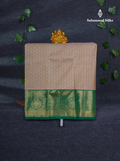 Semi Silk Pattu Pavadai ( Beige ) with Contrast Bottle Green Blouse 27"