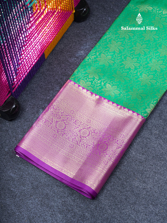 Semi Silk Pattu Pavadai (Saffire Green) With Contrast Purple Blouse 45"