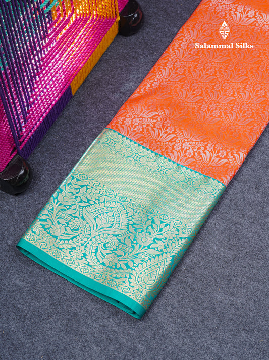 Semi Silk Pattu Pavadai (Pinkish Orange) With Peacock Green Blouse 44"