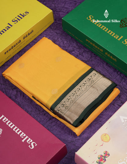 Beautiful Yellow Pure Kanjivaram Silk Saree With Contrast Bottle Green Traditional Medium Border