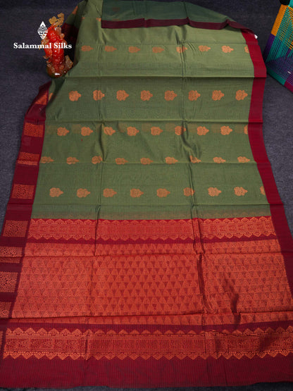 Beautiful Elaichi Green Zari Butta Kota Cotton Saree With Contrast Dark Maroon Fancy Border