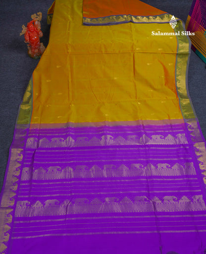 Beautiful Manthulir Yellow Semi Silk Cotton Saree With Contrast Purple Traditional Border